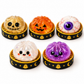 Five possible Halloween Mystery designs, plus a sixth secret color not shown. One random squishy per box.
